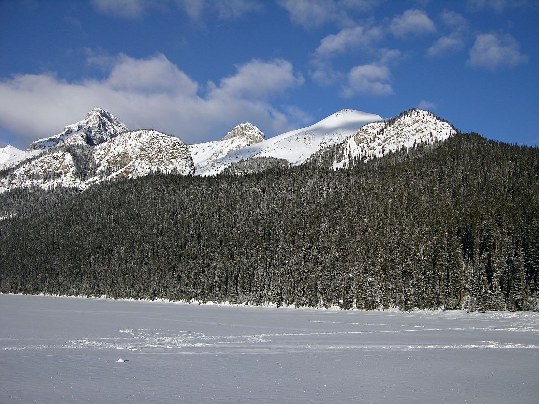 16 Mount Whyte, Big Beehive, Mount Niblock and Mount St Piran and Frozen Lake Louise Morning